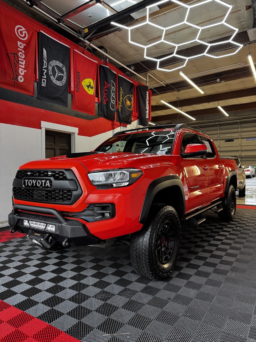 Red Toyota Tacoma after a full detail
