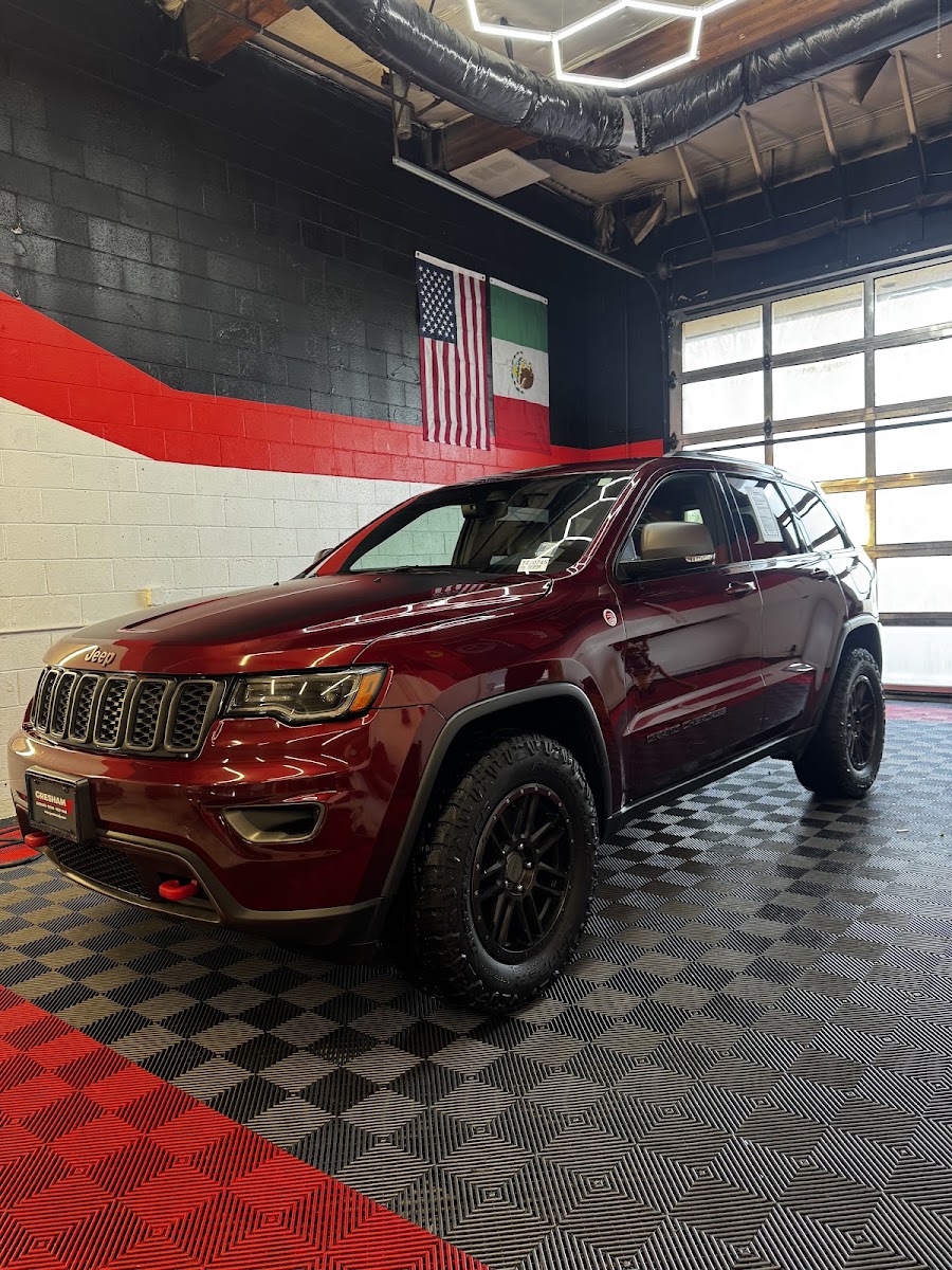 Red Jeep Grand Cherokee after a detail