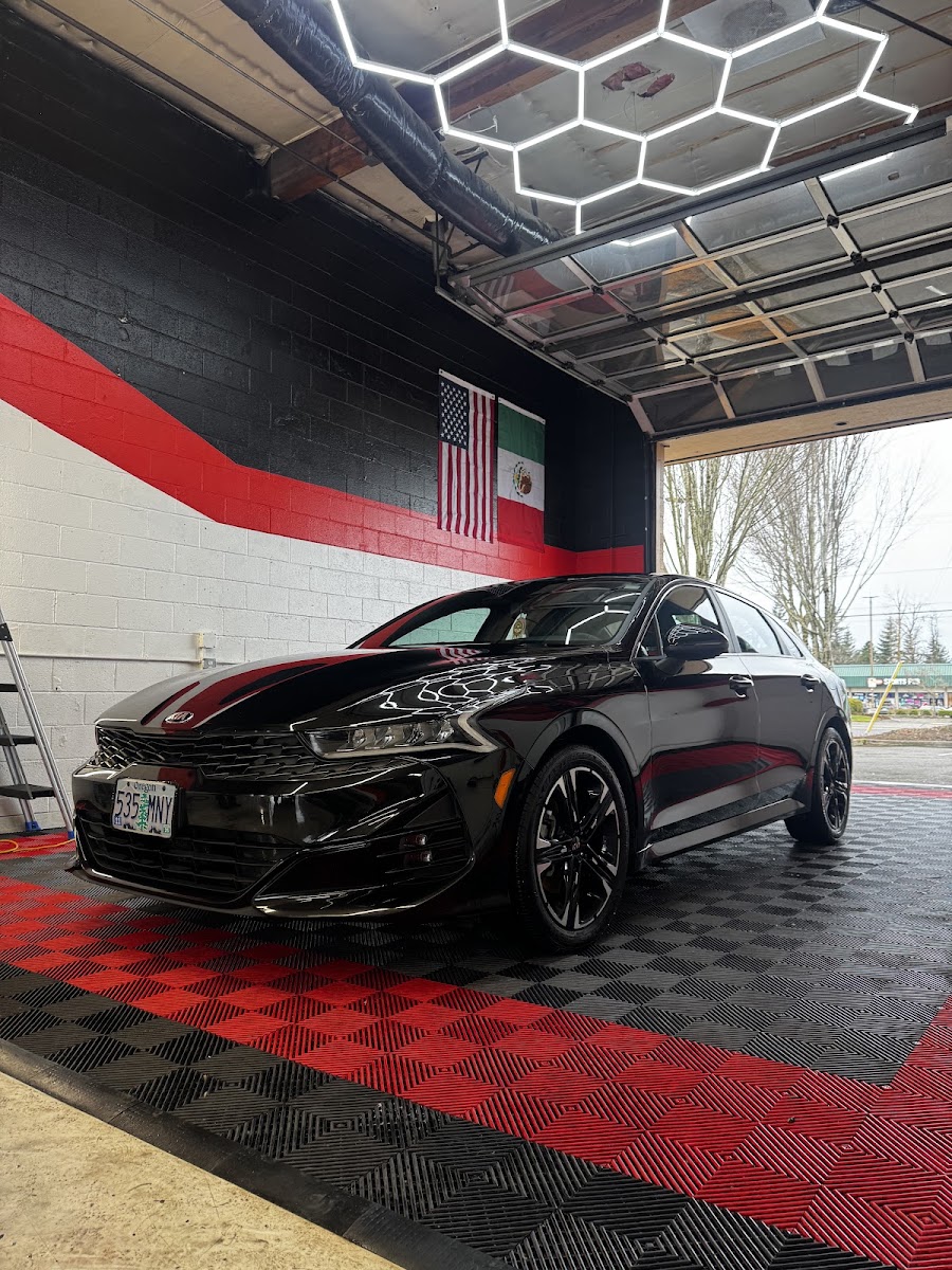 Black sedan with polished paint