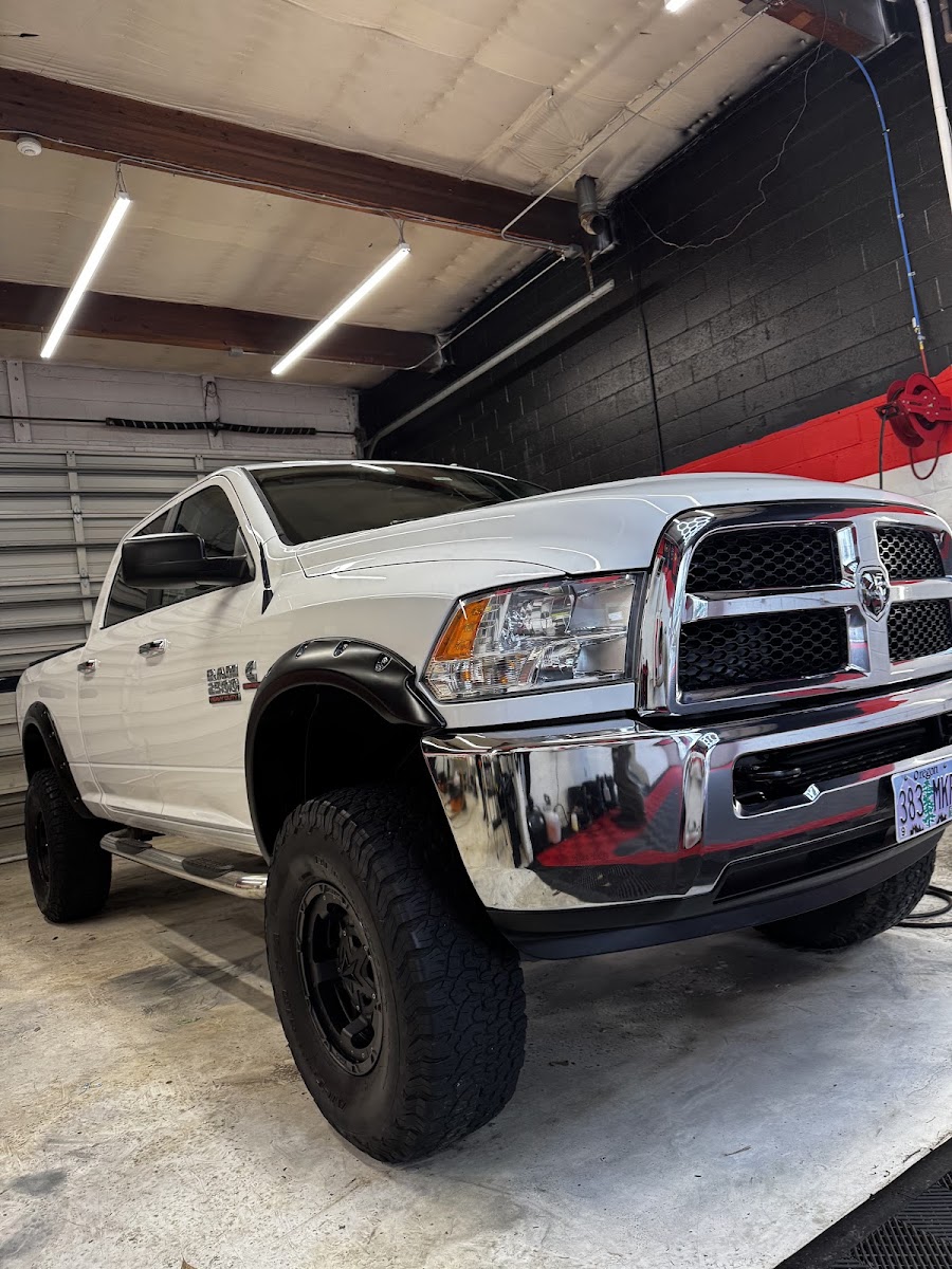 White lifted Ram truck after detailing